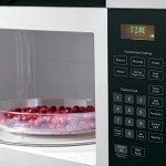GE 1.6 Cu. Ft. Over-the-Range Microwave Oven Bundle