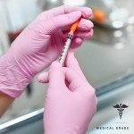 Pink Nitrile Exam Gloves - Powder-Free, 100 Pack