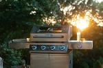 Monument 4-Burner Propane Gas Grill with Cover