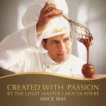 Lindt LINDOR Assorted Chocolate Candy Truffles, Dark Chocolate, Milk Chocolate and White Chocolate Truffles with Smooth Truffle Center, 7.6 oz Box