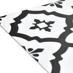 Comet Peel & Stick Black Floor Tiles by FloorPops