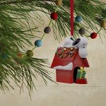 Hallmark Peanuts Snoopy on Holiday Doghouse Christmas Ornament