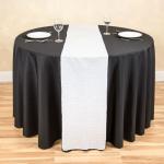 - Black Polyester 108-Inch Round Tablecloth
