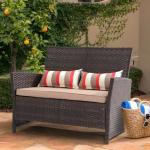 Sunsitt Brown Wicker Loveseat with Beige Cushions
