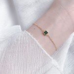 Elegant 14K Gold Bracelet with Emerald Stones