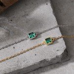 Elegant 14K Gold Bracelet with Emerald Stones