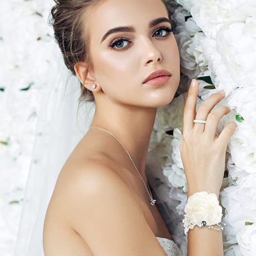 White satin rose corsage and boutonniere set