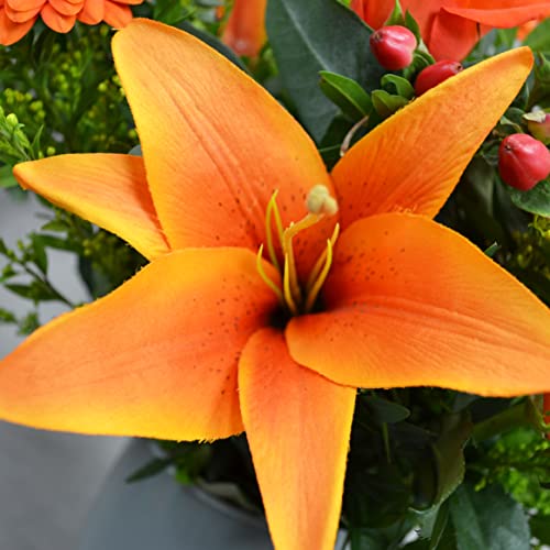 Orange Roses and Lilies Bouquet by Florists