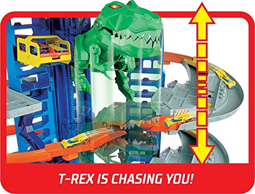Hot Wheels Toy Car Track Set City Ultimate Garage Moving T-Rex Dinosaur, 100+ 1:64 Scale Vehicle Storage, 3-Ft Tall, 2 Toy Cars