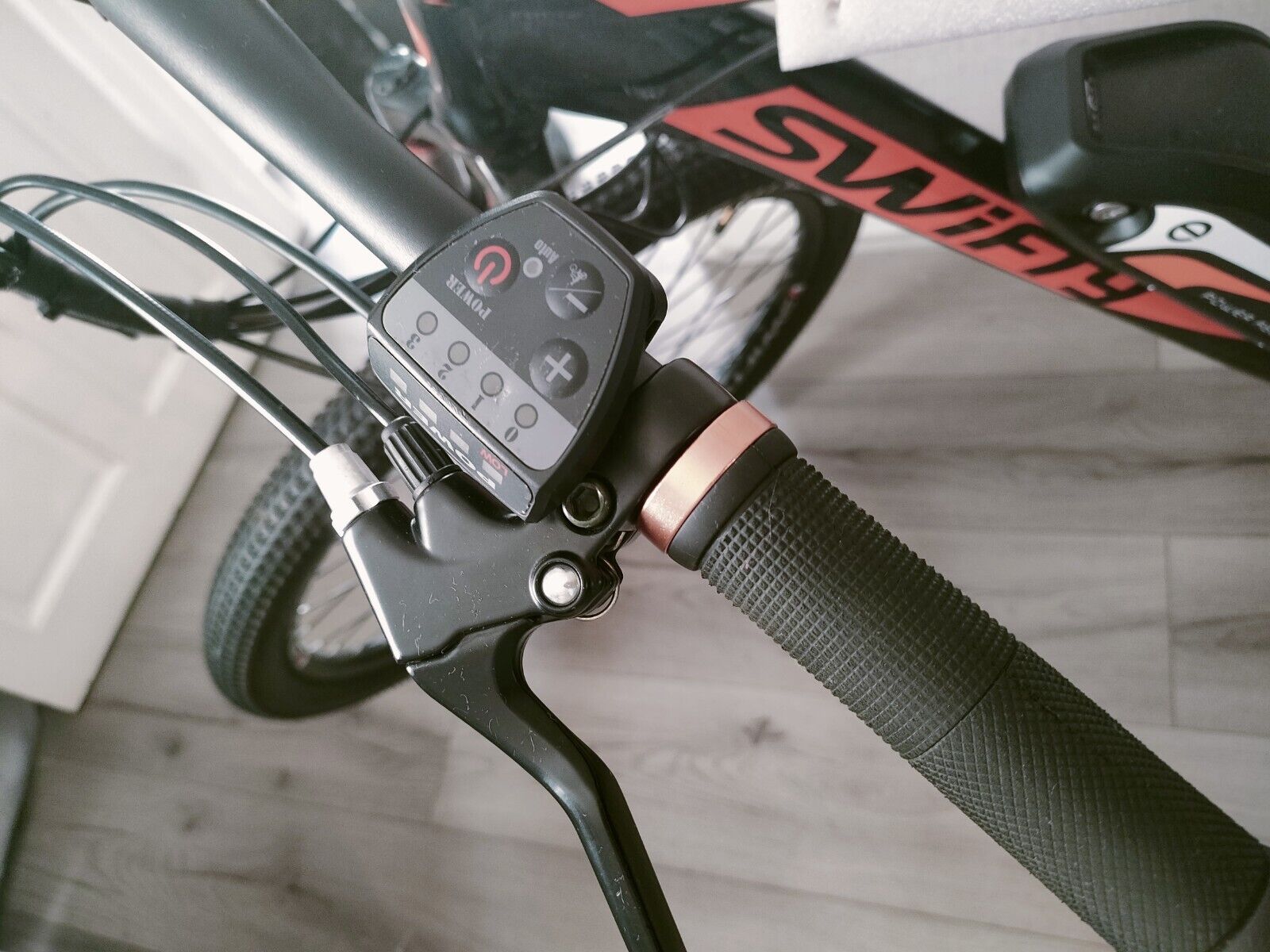 Black and Orange Swifty Electric Mountain Bike