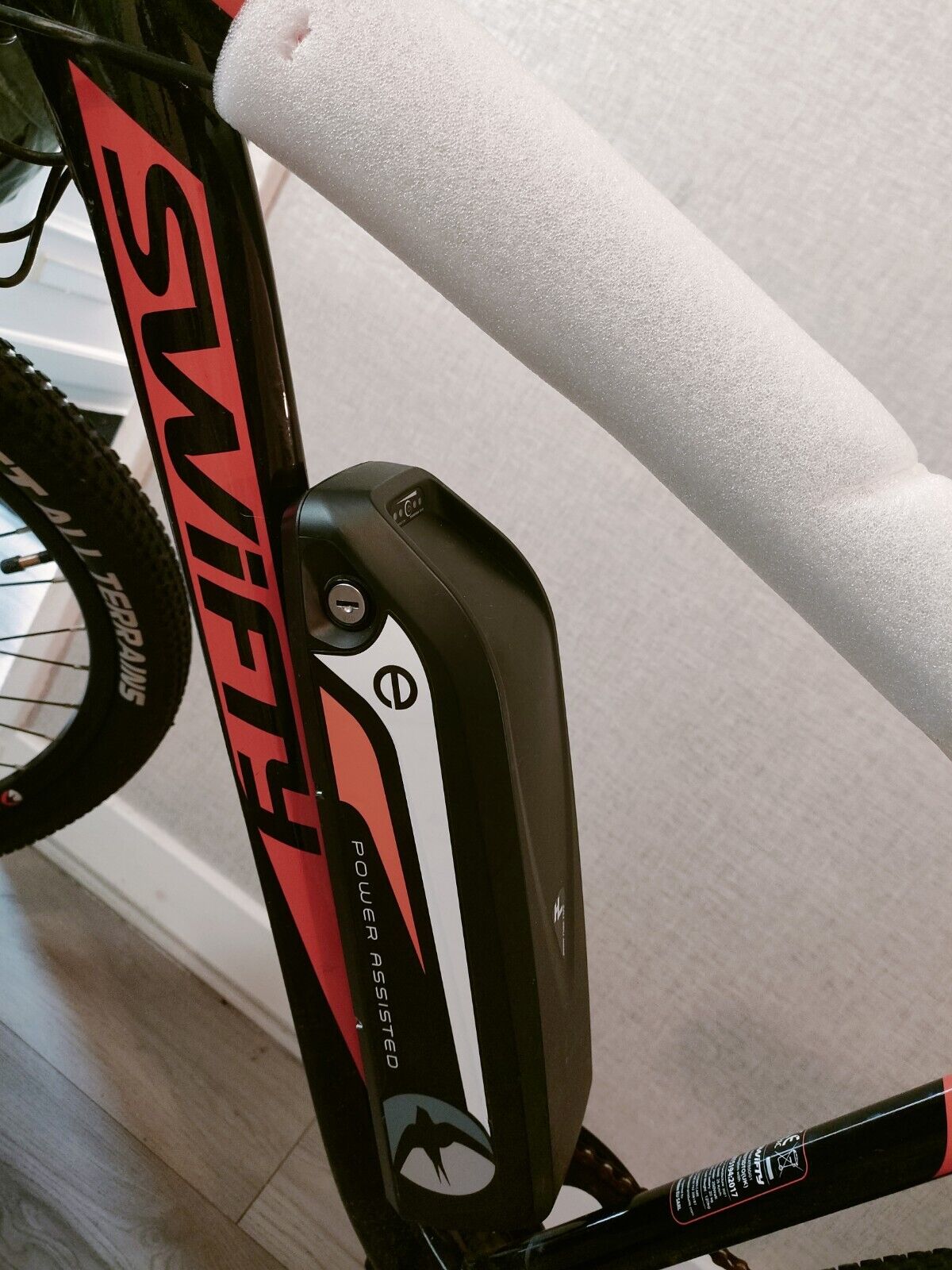 Black and Orange Swifty Electric Mountain Bike