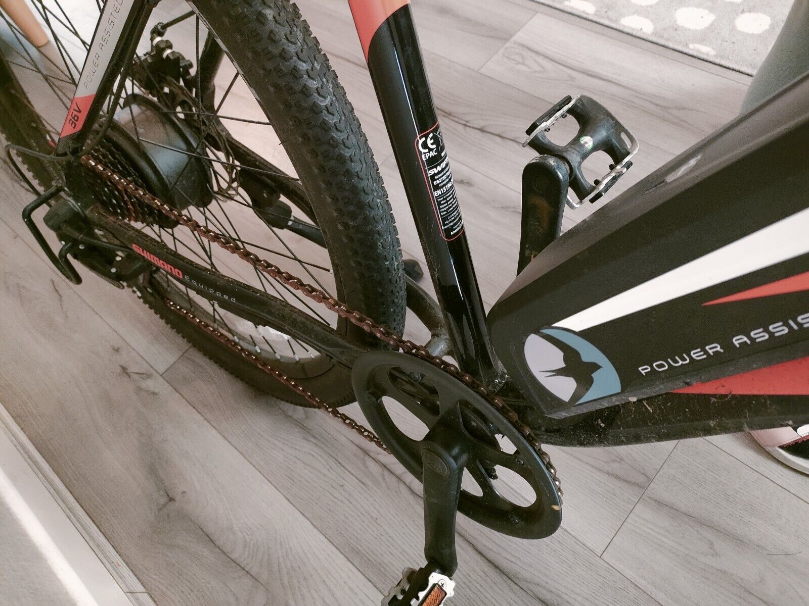 Black and Orange Swifty Electric Mountain Bike