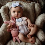 Lifelike 12" Reborn Baby Girl Doll with Smile