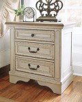 Realyn French Country 3-Drawer Nightstand with Outlets