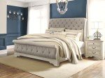 Realyn French Country 3-Drawer Nightstand with Outlets