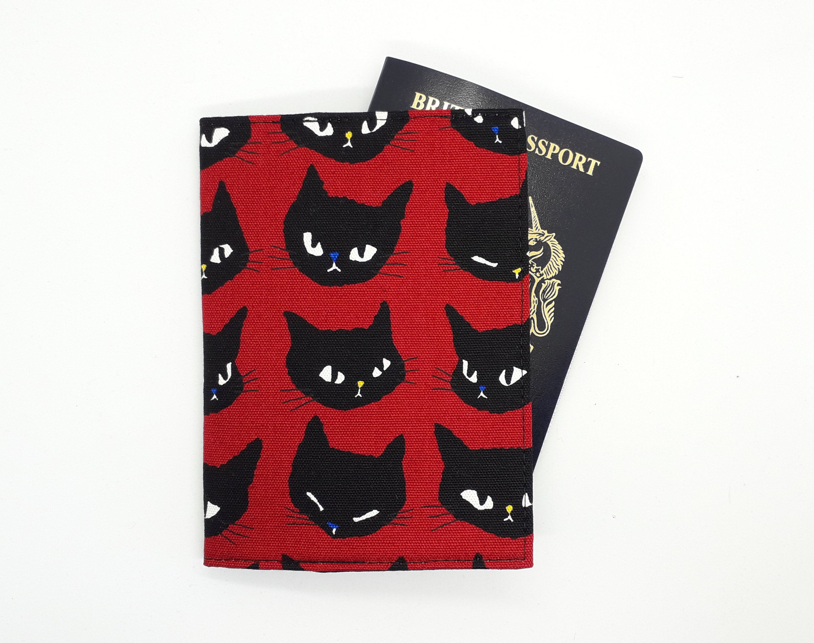 Cat-themed travel essentials in red & black