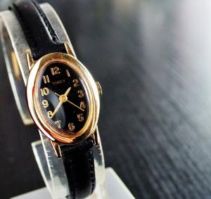 Vintage Timex Oval Dial Women's Gold & Black Watch
