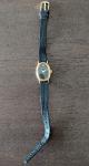Gold Timex Oval Women's Dress Watch with Black Dial