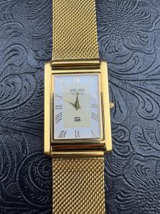 Gold and White Vintage Seiko Slim Wrist Watch