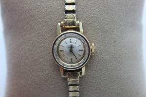 Omega Ladies Diamond Cut Crystal 14K Gold Watch