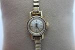 Omega Ladies Diamond Cut Crystal 14K Gold Watch