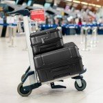 2-Piece Black Hard Shell Luggage Set with Pockets