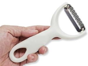 Wavy Peeler Grater with White Plastic Handle