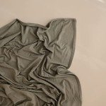 mushie Stretchy Baby Swaddle Blanket | Extra Soft & Snug Fit | 47"x47" (Dried Thyme)