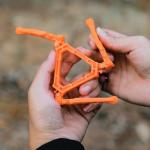 Orange Fuel Can Stabilizer for Camping Stoves,Mini Foldable Outdoor Camping Hiking Cooking Gas Tank Stove Stand,Stoves and Grills，Foldable Cartridge Canister Tripod Bracket for Hiking Camping Outdoor