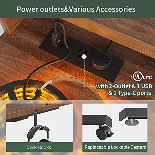 FEZIBO Triple Motor L Shaped Stadning Desk with LED Strip & Power Outrlets，63 inches Height Adjustable Stand up Corner Desk with Ergonomic Monitor Stand, Black Frame/Black Walnut Top