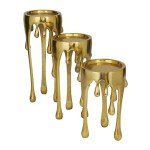 CosmoLiving by Cosmopolitan Aluminum Pillar Candle Holder with Dripping Melting Designed Legs, Set of 3 12", 10", 8"H, Gold
