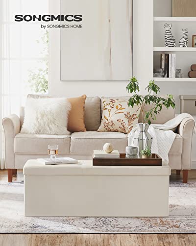 SONGMICS 43 Inches Folding Storage Ottoman Bench, Storage Chest, Footrest, Coffee Table, Padded Seat, Faux Leather, Holds up to 660 lb, Beige ULSF70M