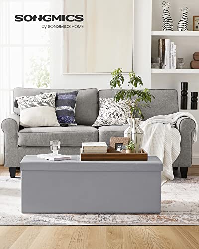SONGMICS 43 Inches Folding Storage Ottoman Bench, Storage Chest, Footrest, Coffee Table, Padded Seat, Faux Leather, Holds up to 660 lb, Light Gray ULSF70GY, L(15 x 43 x 15 Inches)