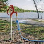 Camco Flexible Hose Protector-Eliminates Hose Crimping and Straining at Faucets and Water Connections, Creates Hose Flexibility (22703) - 22703-A , Yellow