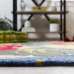 Safavieh Ivory Hand Hooked Polyester Pile Rug