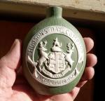 EARLY 1900 HUDSON'S BAY COMPANY EST.1670 GREEN SCHAFER VATER CERAMIC WHISKEY NIP