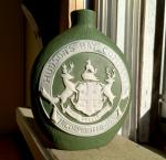 EARLY 1900 HUDSON'S BAY COMPANY EST.1670 GREEN SCHAFER VATER CERAMIC WHISKEY NIP