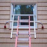 Ladder Stabilizer and Safety Rail System