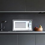 Farberware Countertop Microwave 1000 Watts, 1.1 cu ft - Microwave Oven With LED Lighting and Child Lock - Perfect for Apartments and Dorms - Easy Clean White, Platinum