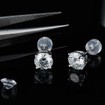 Moissanite Stud Earrings in White Gold Plated Silver