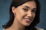 Twisted Oval Diamond Hoop Earrings in Silver