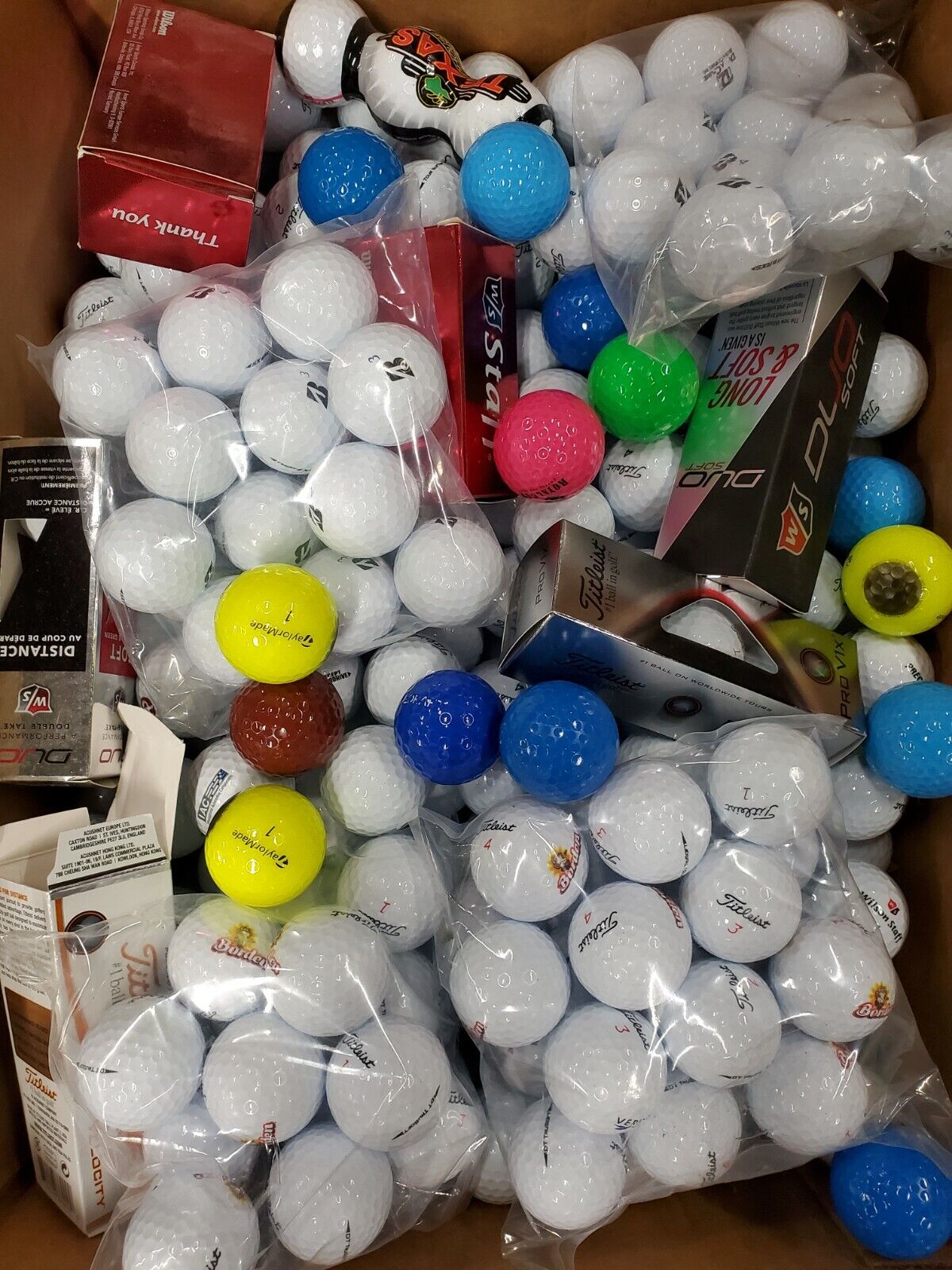 40 Assorted New Golf Balls. Brands like Titleist!!