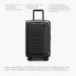 Monos Carry-On Pro Plus Luggage (23"), Hardside Spinner Suitcase with TSA Lock & Front Pocket, Airline Approved, Midnight Black
