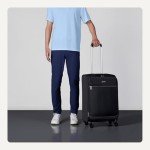 Amazon Basics Luggage, 25" Medium Checked Softside Suitcase With Wheels, With Four 360-Degree Multi-directional Spinner Wheels, Expandable Space, Zippered Pocket and Straps, Telescopic Handle, Black