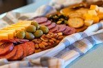 Dan the Sausageman Sounder Gourmet 11 item Snacks Gift Box, Featuring Summer Sausage Beef, Vintage Swiss & Cheddar Cheese, Sweet & Hot Mustard, Pretzels, Addiction Granola, & Garlic Olives, Almond Roca