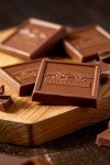 Golden Gourmet Classic Gift Basket: Ghirardelli Caramel Squares, Lindor Truffles, Rasperry Dark Chocolate Bar, Dolcetto Wafers, Chocolate Drizzled Caramel Popcorn & More!
