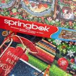 Springbok's Christmas Boutique 1000 Piece Jigsaw Puzzleby Artist Gina Jane Features a Cozy Holiday Boutique Overflowing with Festive Gifts