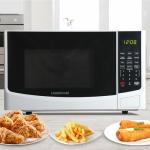 Farberware 0.9 Cu. Ft. Countertop Microwave Oven – 900W Power, Auto Cook Settings, Defrost, and Safety Lock – White