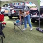 Coleman Portable Camping Chair with 4-Can Cooler, Cushioned Seat & Back with Side Pockets & Cup Holder, Carry Bag Included, Great for Camping, Tailgating, Firepits, Patio, & More