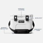 YETI Roadie 15 Hard Cooler with DoubleDuty Shoulder Strap, Big Sky Blue